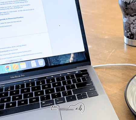 laptop with a mom blog post being written on pages displayed