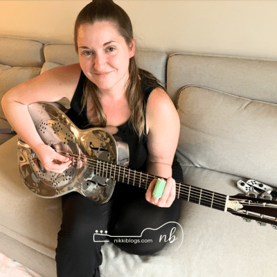 homeschool mom playing guitar