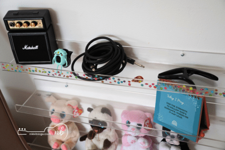 kids guitar accessories in bedroom