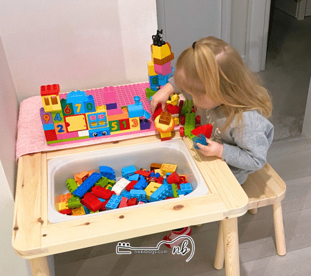 girls playing with lego duplo, one of the best toddler toys